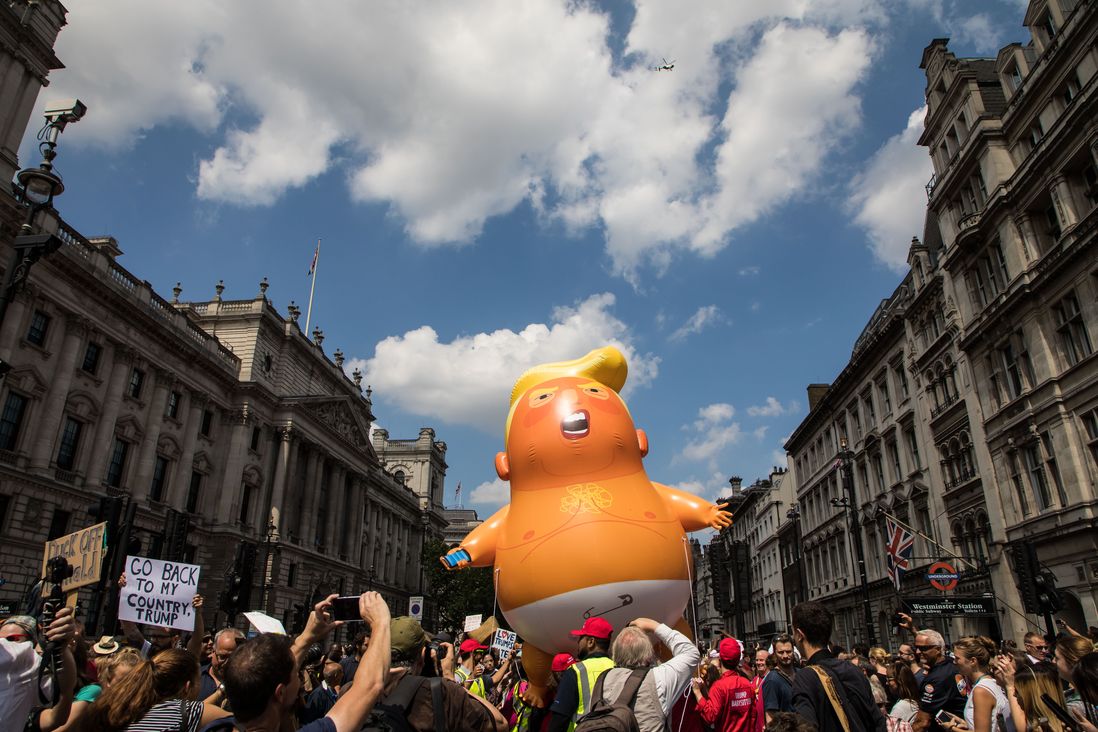 An inflatable 'Trump Baby' blimp is flown among tens of thousands of protesters gathered in central London to protest the State visit of US President Donald Trump on July 13, 2018 (Vianney Le Caer/Shutterstock)